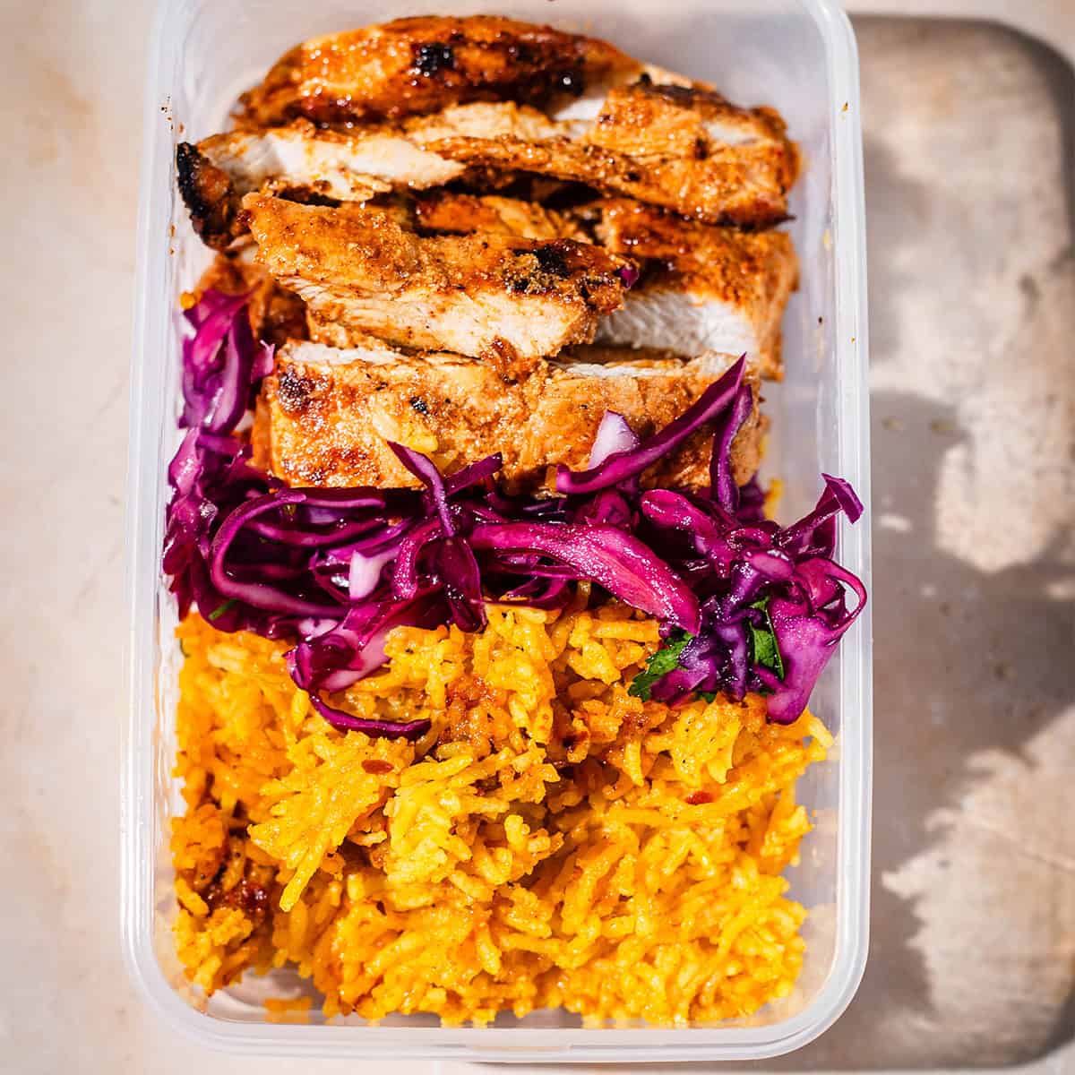 Chicken Doner, Cabbage and Yellow Rice in a tub