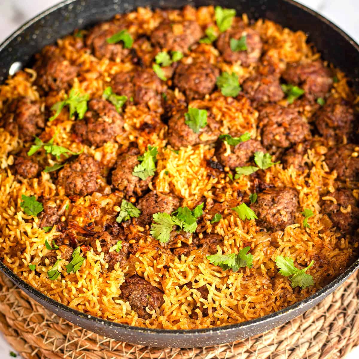 One Pot Seekh Kebab Meatballs and Pulao Meatballs and rice in dish