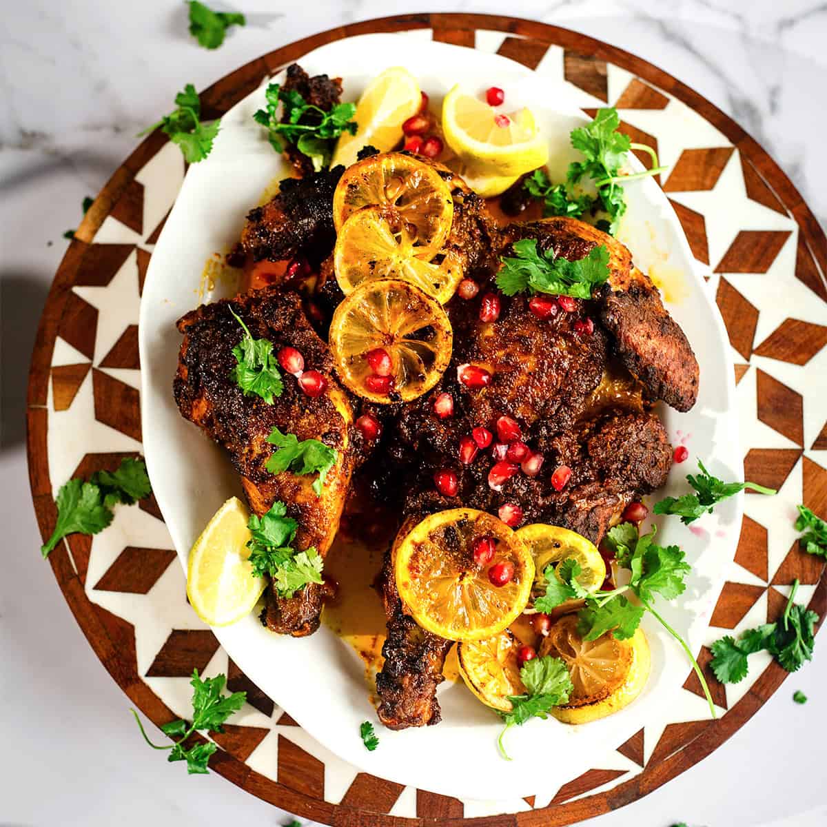 Shawarma Spatchcock Roast Chicken (Easy Middle Eastern Roast Chicken) Shawarma Spatchcock chicken on platter