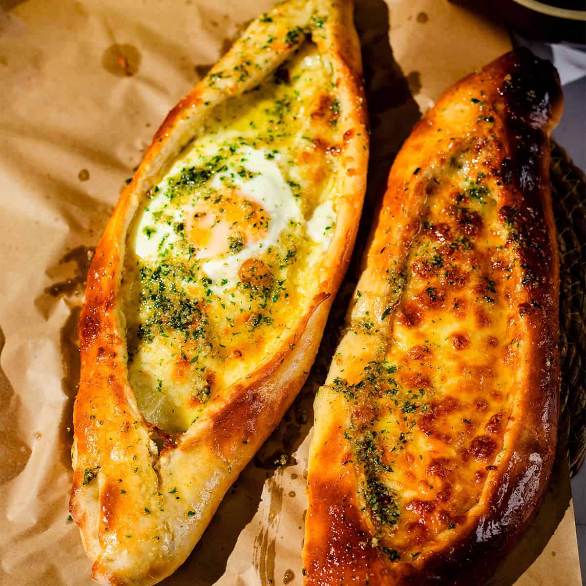 Khachapuri (Georgian Cheese Bread) kachapuri on baking paper