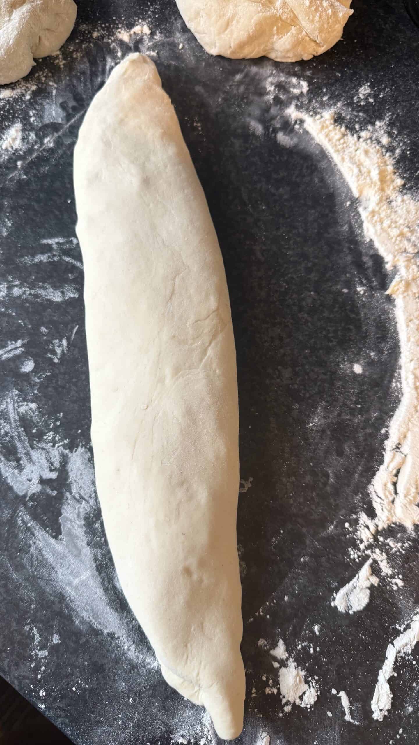 Khachapuri (Georgian Cheese Bread) Kachapuri seam side down on table