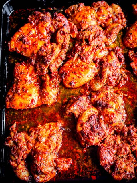 Harissa thighs in tray