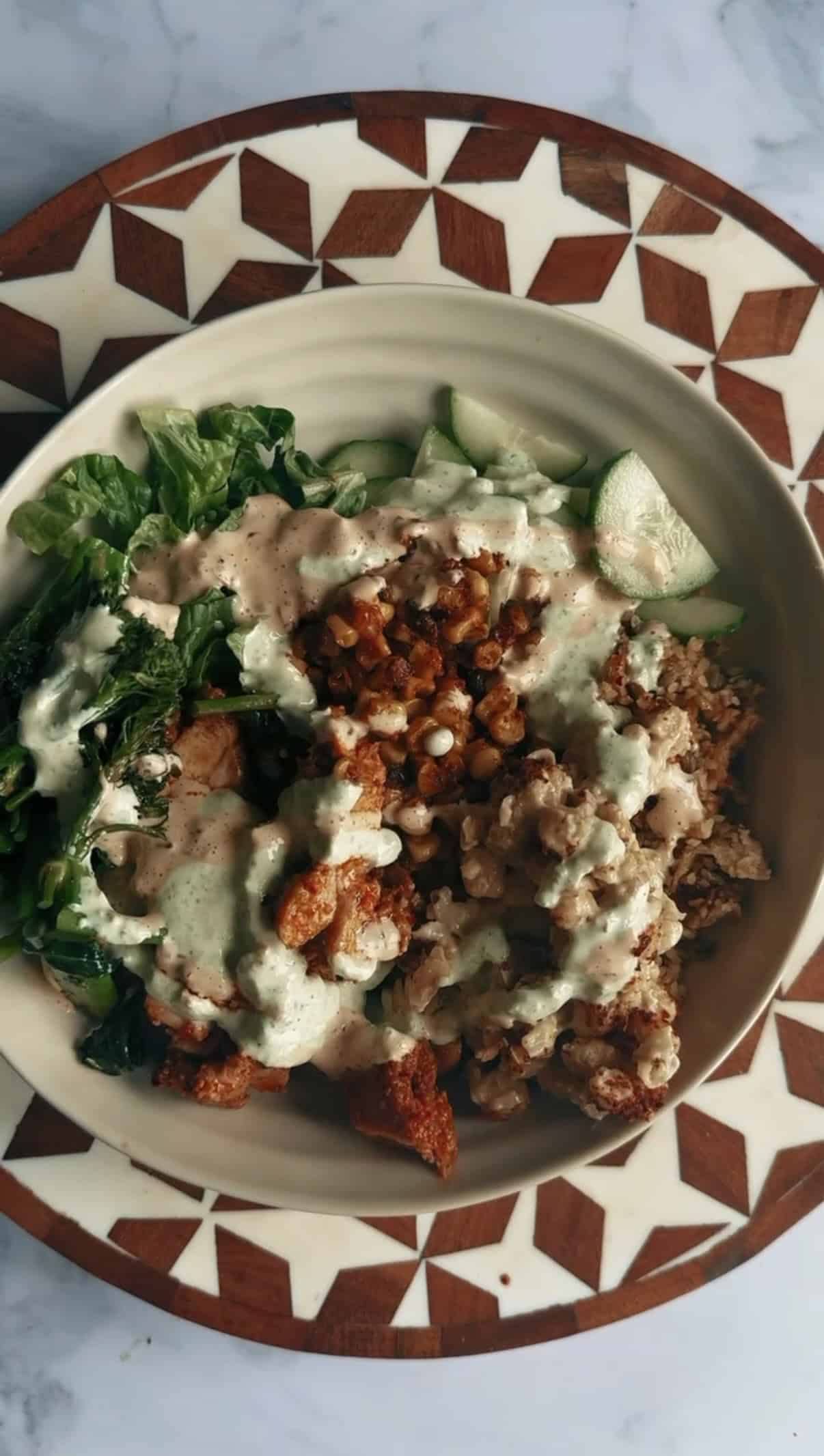 ATIS-Inspired Loaded Grain Bowl with Blackened Chicken Dressings added to bowl