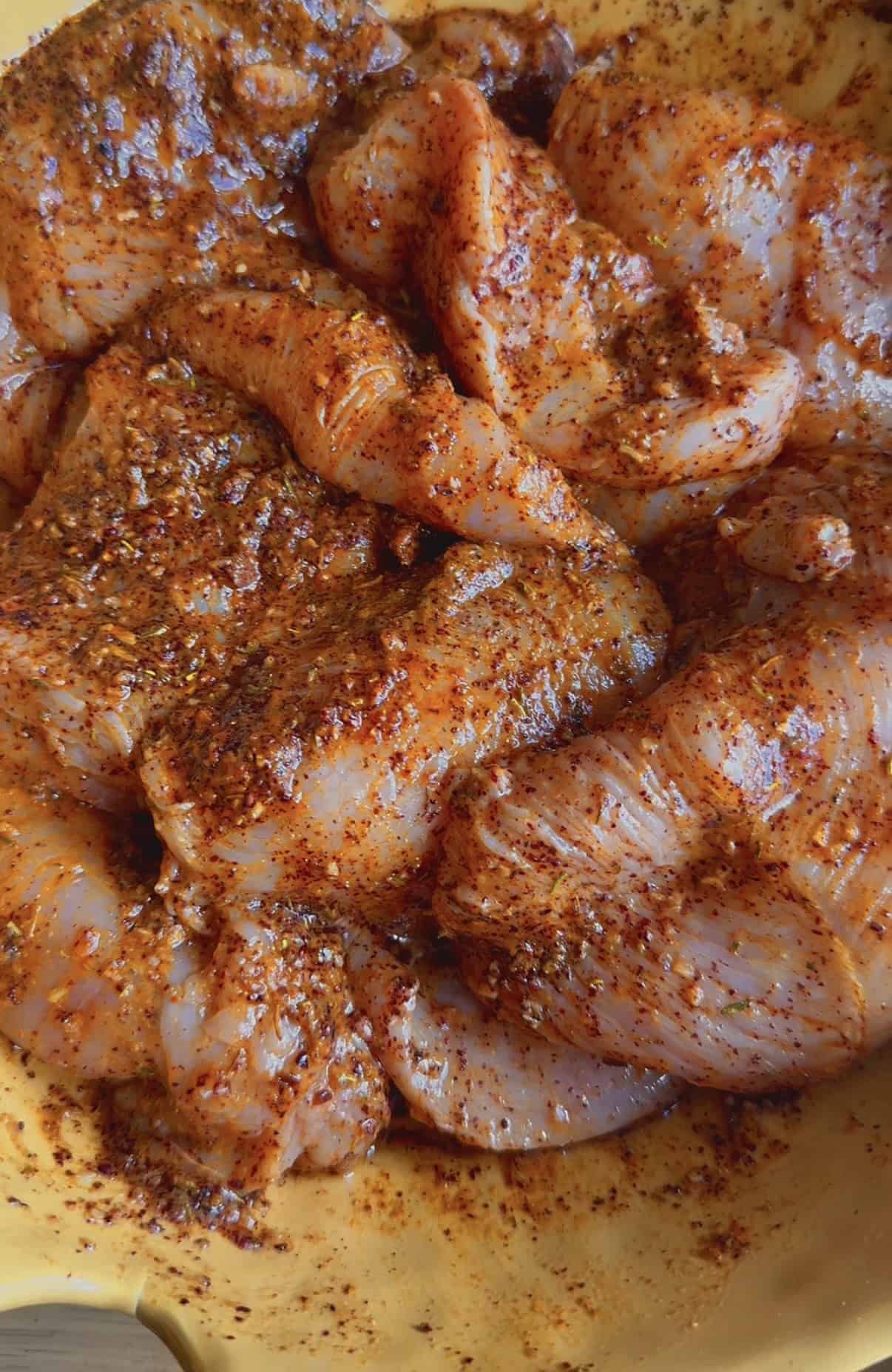 Chicken Shawarma Bowls with Garlic Sauce & Turmeric Rice Chicken shawarma and marinade in bowl