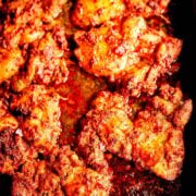 Harissa thighs in tray