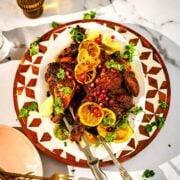 Shawarma spatchcock chicken on platter