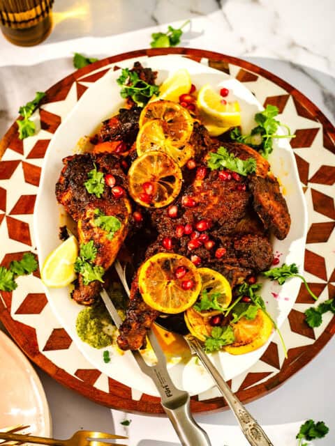 Shawarma spatchcock chicken on platter