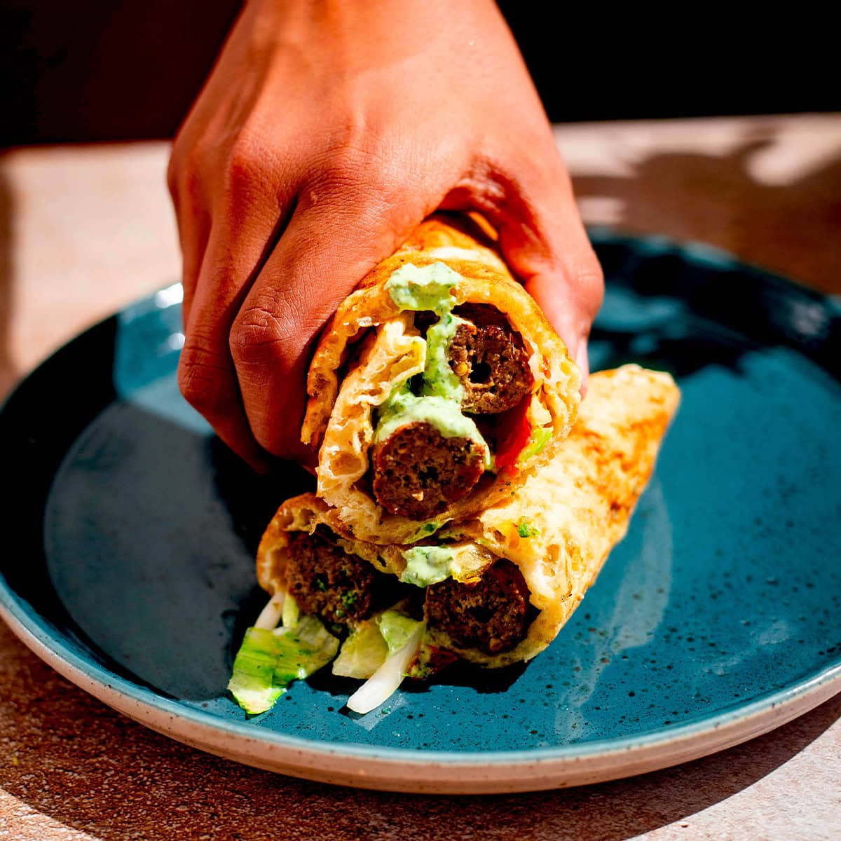 Pakistani Lamb Seekh Kebabs (Restaurant-Style) Seekh kebab wrap in plate