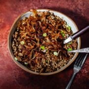 Maftoul with crispy onions in bowl