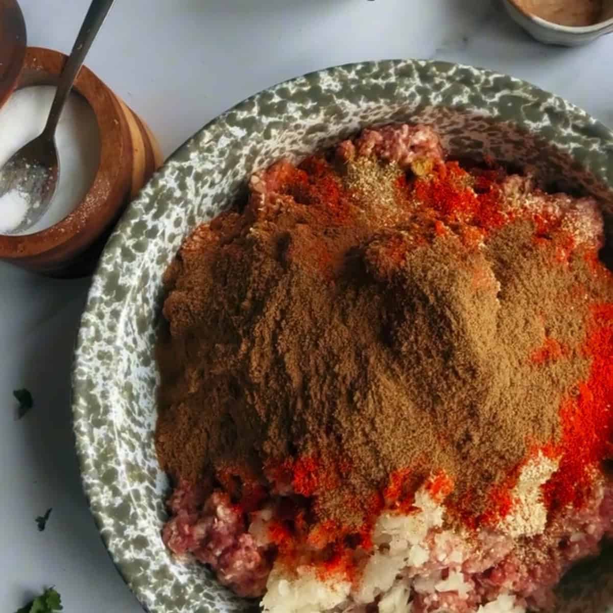Middle Eastern Smash Tacos (Lebanese-Inspired) Lamb and spices in bowl