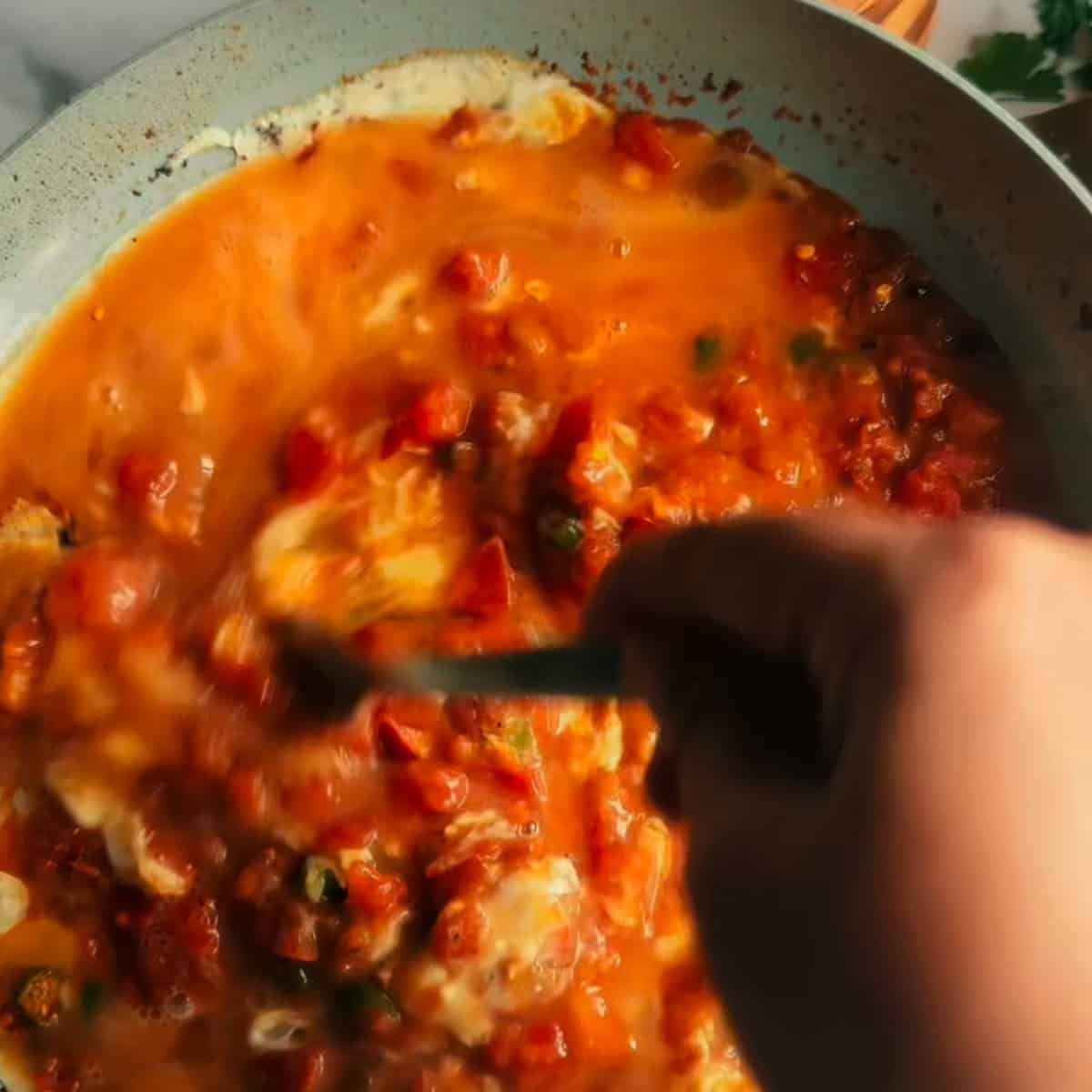 Eggs added to pan