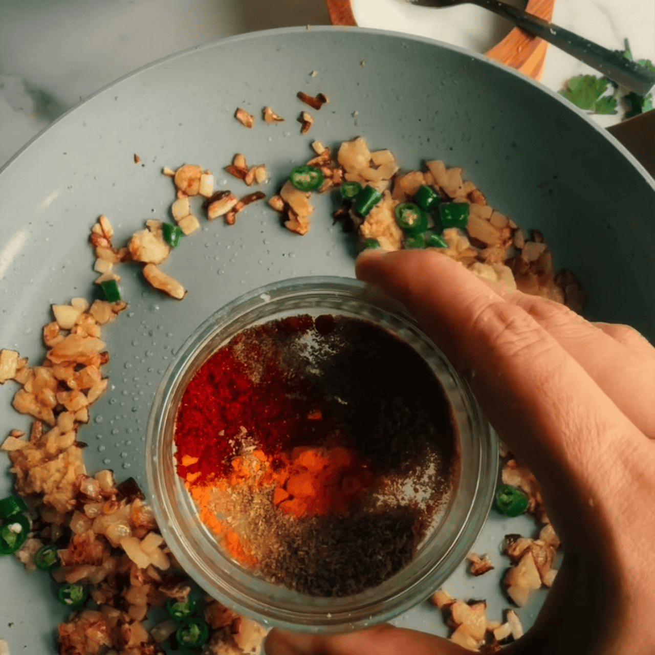 Spices added to pan