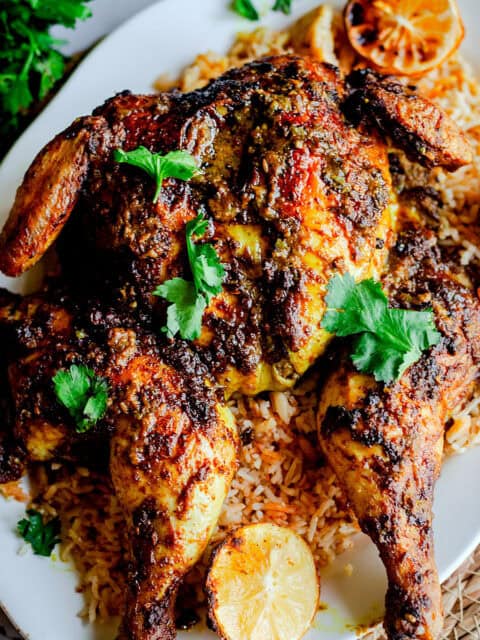 Mandi chicken on rice on platter