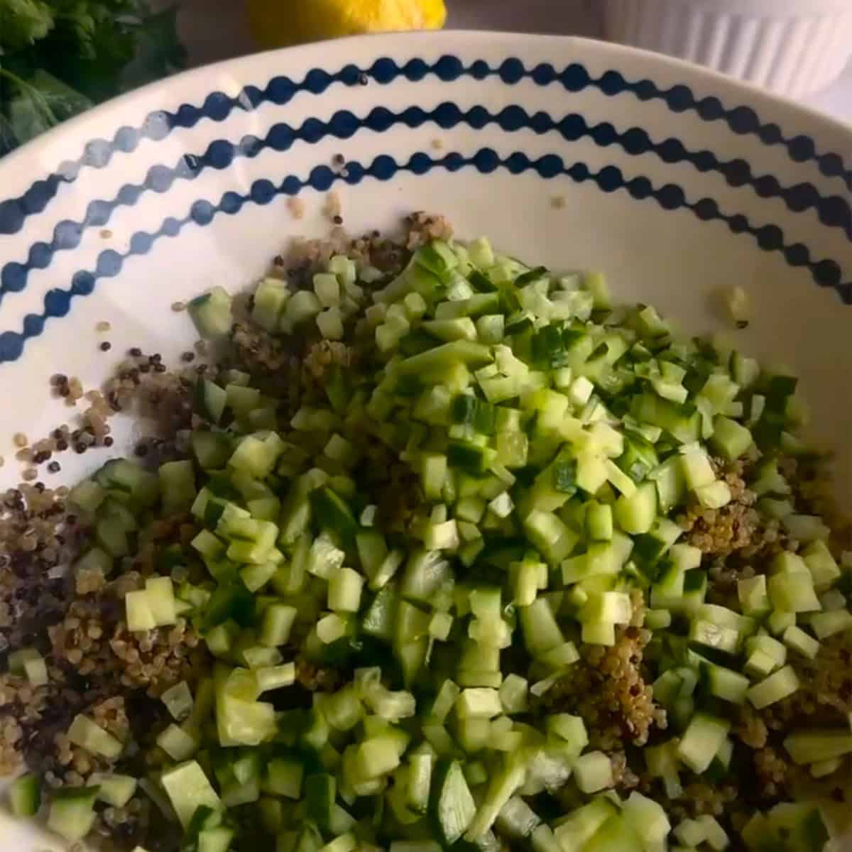 Cucumber added to bowl