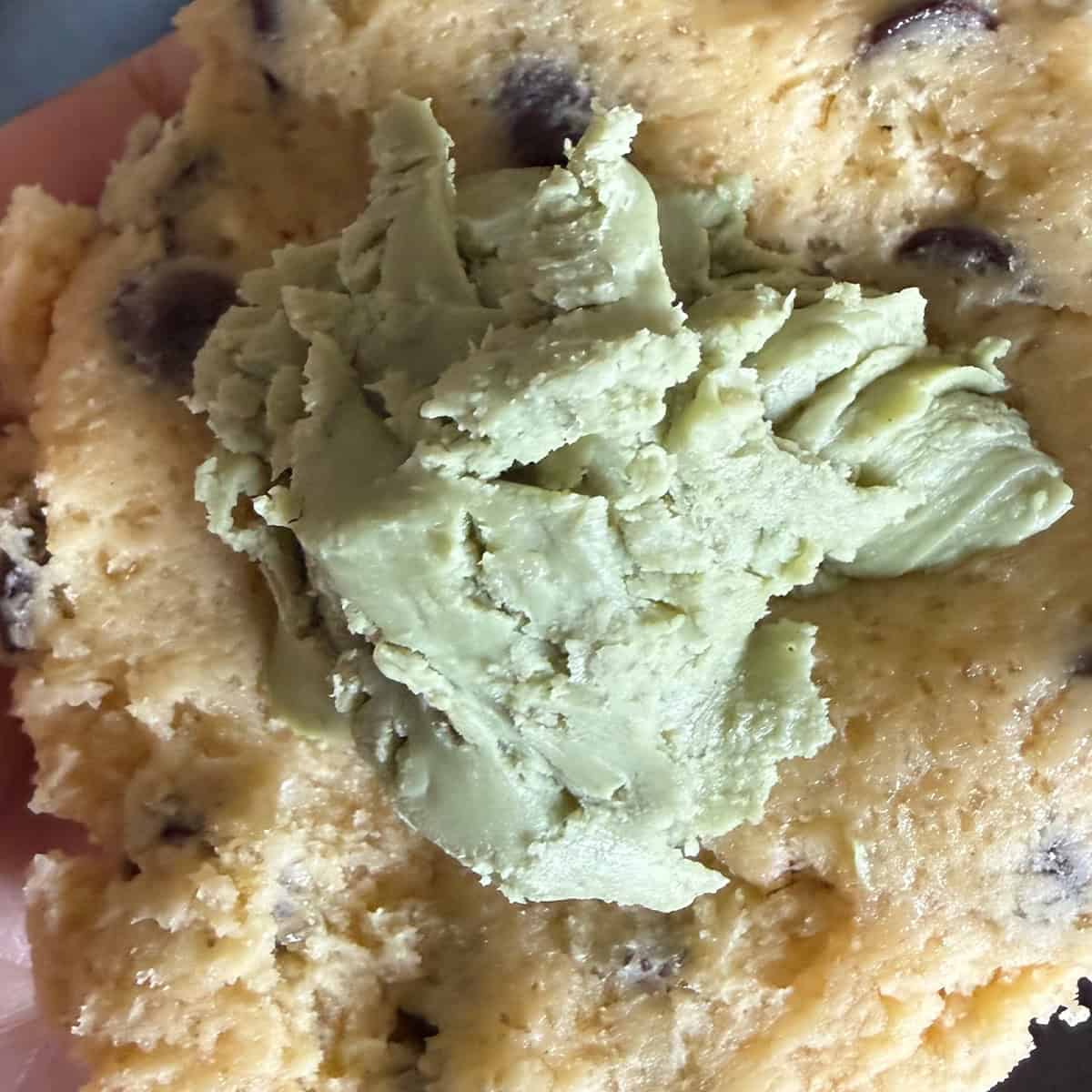 Pistachio creme added to middle of cookie dough