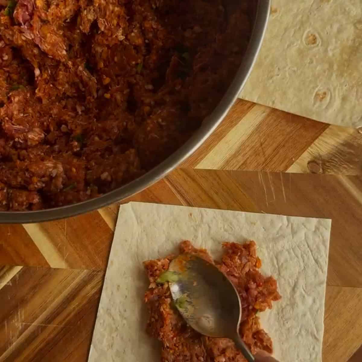 Tortilla squares with lamb mince on top