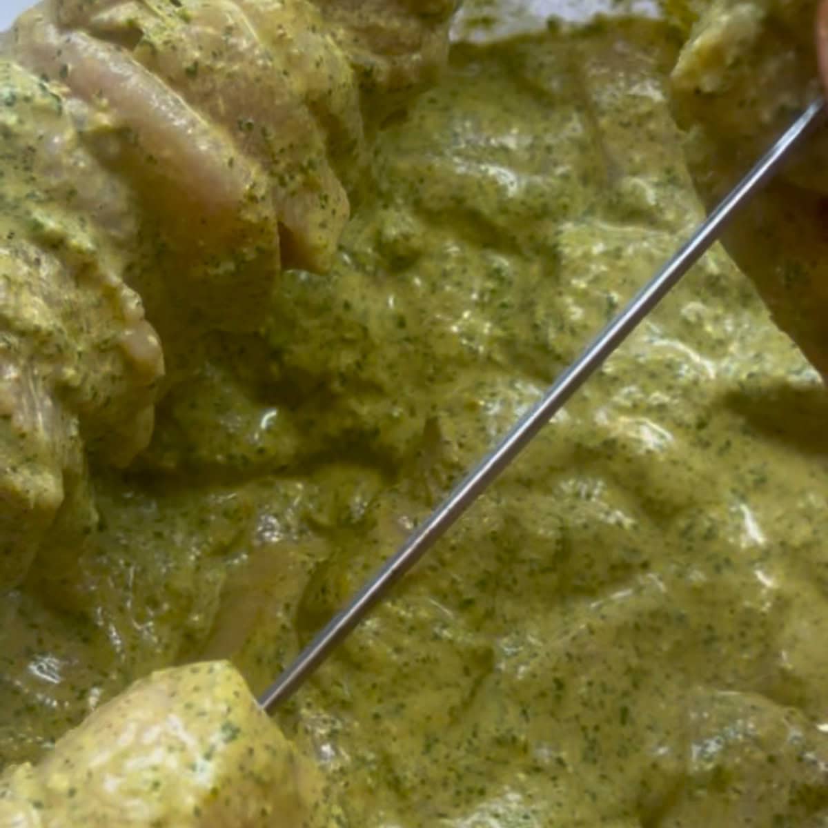 Chicken threaded onto skewers