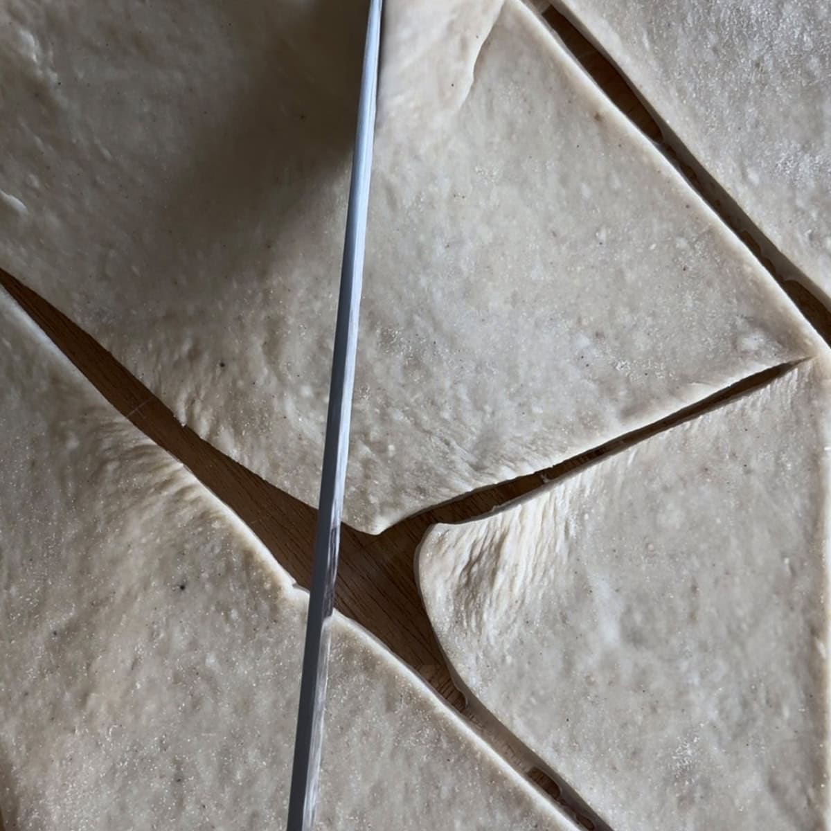 Dough cut into triangles