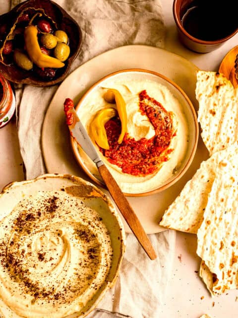 Hummus and sides on table