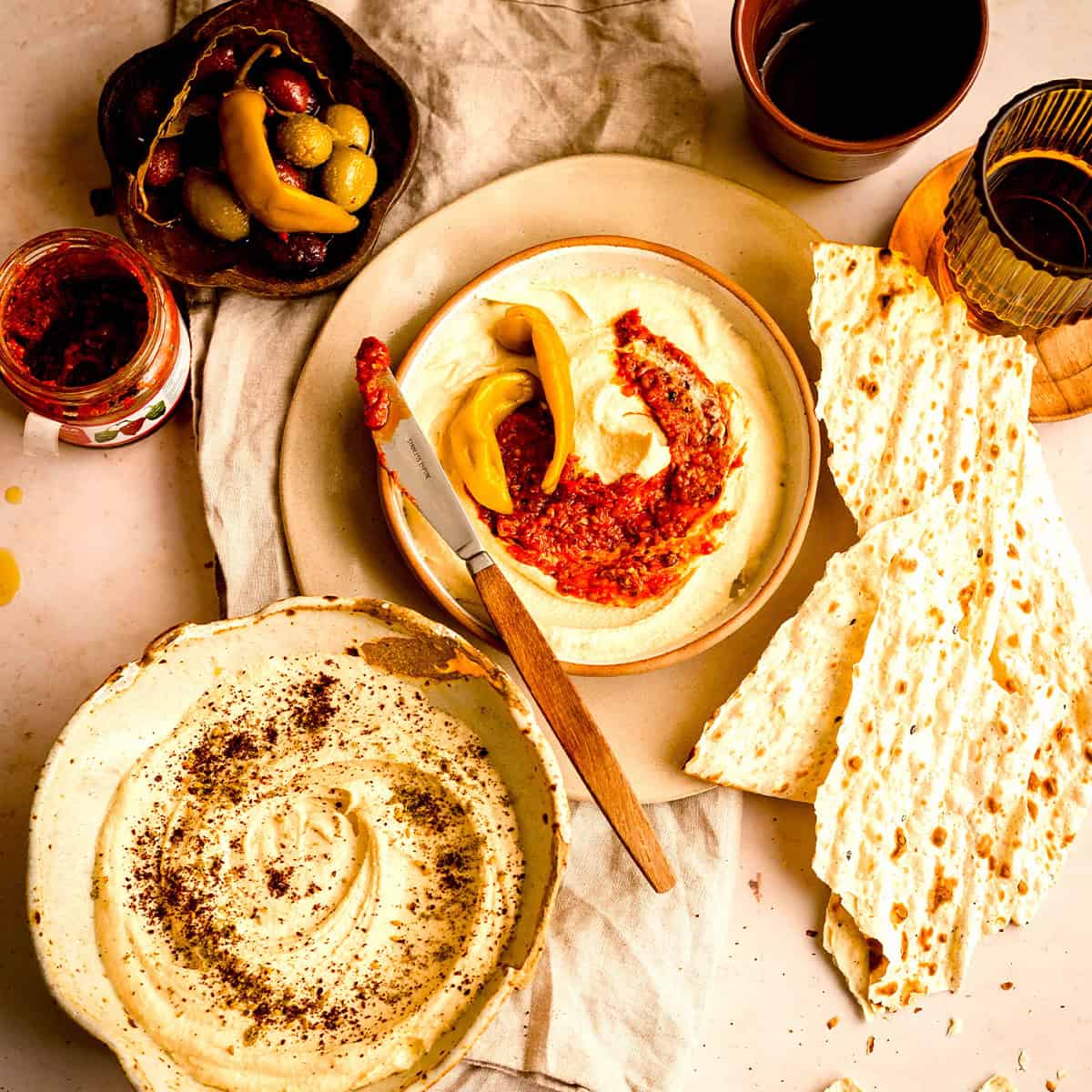 Hummus and sides on table