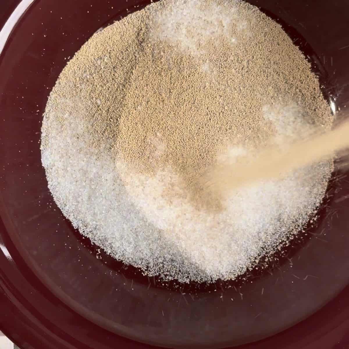 Yeast and sugar in bowl