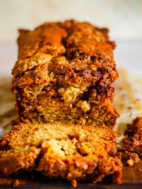 Cinnamon loaf cake with a slice cut out