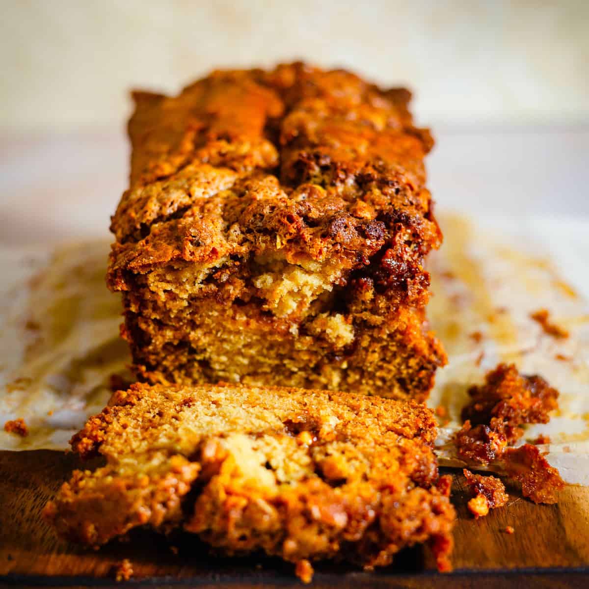 Cinnamon loaf cake with a slice cut out 