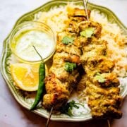 Hariyali Chicken Skewers in plate with Chips