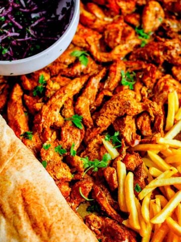 Shawarma in tin, with chips and salad