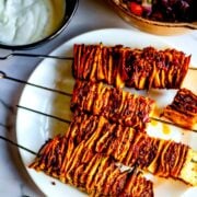 Tortilla kebab skewers on plate